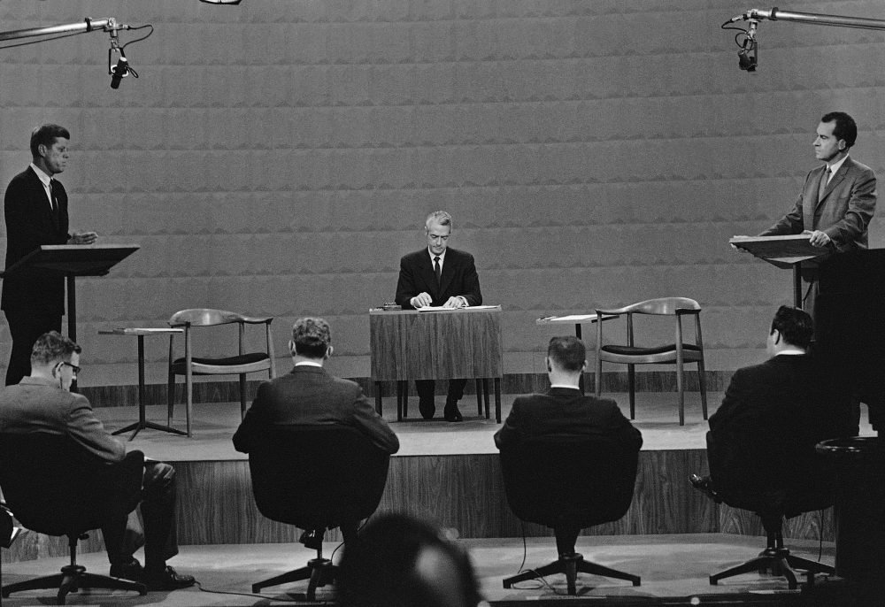 Presidential candidates Sen. John Kennedy left and Vice President Richard Nixon face each other in a Chicago television studio during the first-ever televised presidential debate on Sept. 26 1960. In center is moderator Howard K. Smith