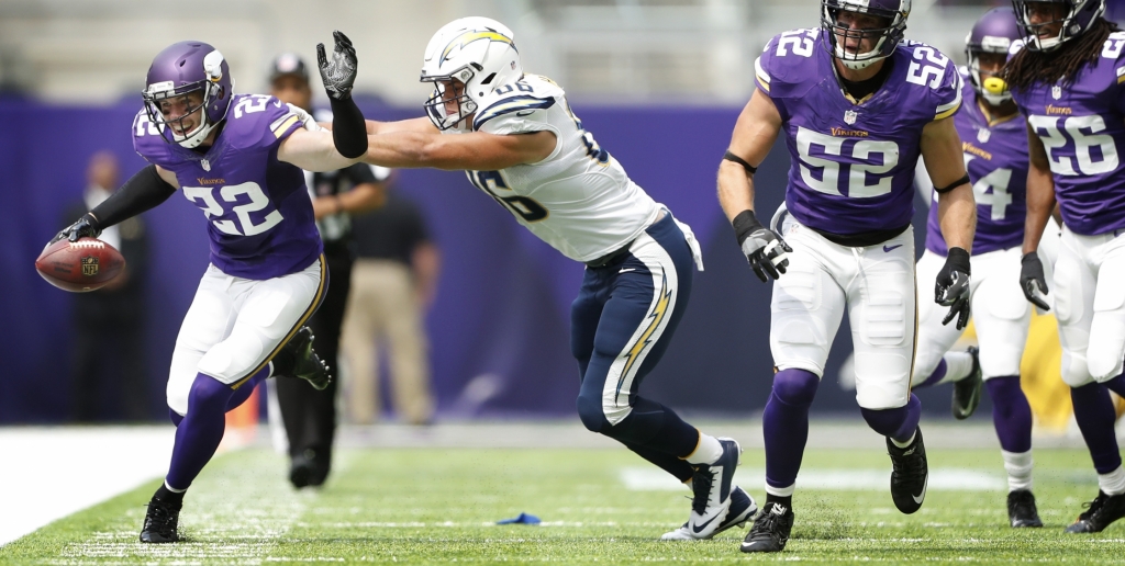 Minnesota Vikings free safety Harrison Smith was pushed out of bounds after intercepting a pass by San Diego Chargers tight end Hunter Henry in the first quarter at U.S. Bank Stadium Sunday