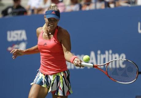 Angelique Kerber of Germany returns a shot to Roberta Vinci of Italy during the quarterfinals of the U.S. Open tennis tournament Tuesday Sept. 6 2016 in New York