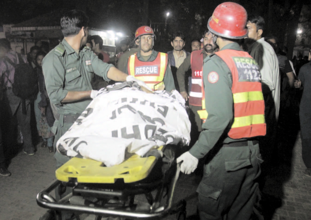 At Least 12 Dead After Two Bomb Blasts In Pakistan