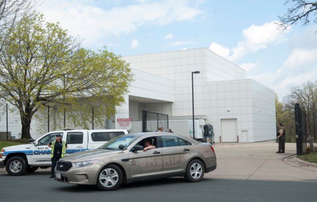 A sheriff's car leaves Paisley Park U.S. music superstar Prince's estate in Chanhassen Minnesota