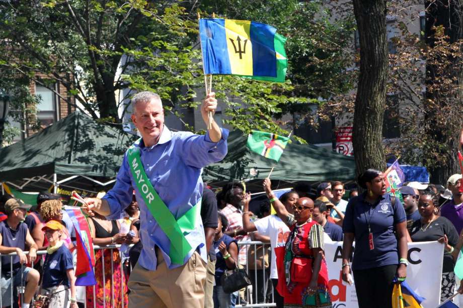 Mayor Bill de Blasio foreground makes his way along Eastern Parkway in the Brooklyn borough of New York as he takes part in the West Indian Day Parade. For years there have been complaints about safety at J'ouv