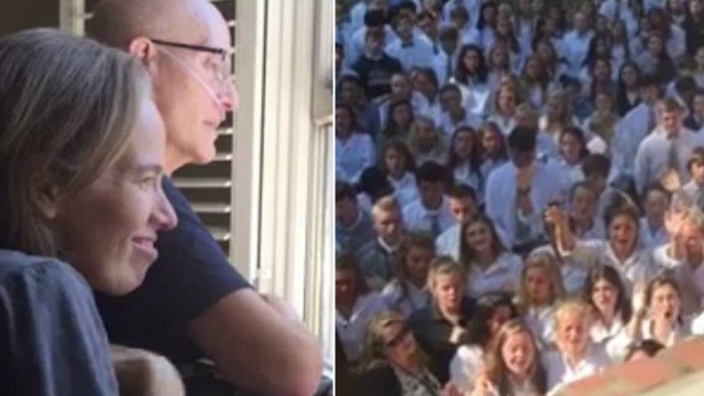 Hundreds of students surprise cancer-stricken teacher with moving singalong on driveway