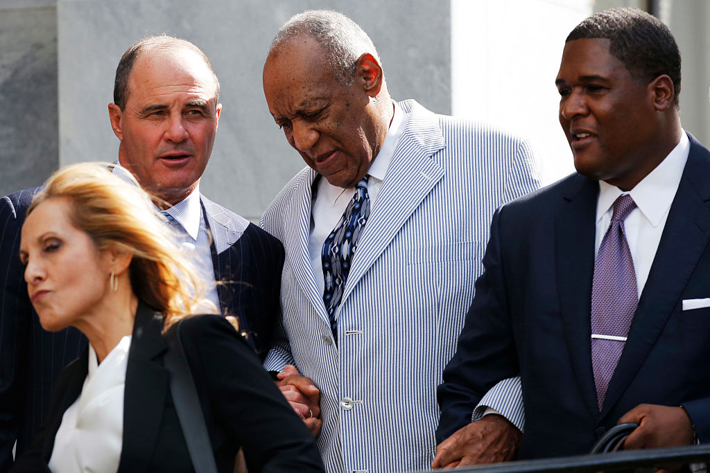 Comedian Bill Cosby leaves the Montgomery County Courthouse with his criminal defense lawyer Brian McMonagle after a pretrial conference related to aggravated indecent assault charges