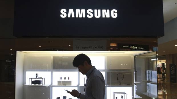 A man passes by a Samsung Electronics shop in Seoul South Korea