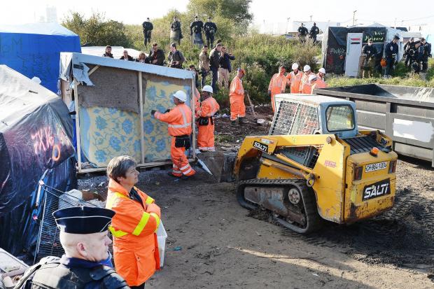 Calais Migrant Camp Set On Fire During Evacuations