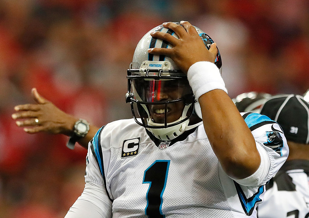 Cam Newton of the Carolina Panthers reacts after being flagged with a taunting penalty against the Atlanta Falcons