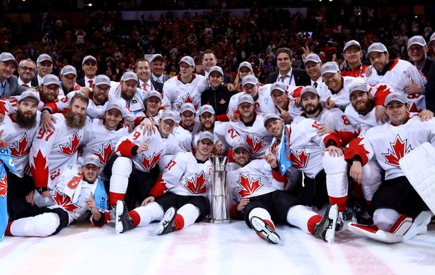 The Canadian team poses with the trophy following a victory over Europe during the World Cup of Hockey finals in Toronto on Thursday Sept. 29 2016. (Bruce