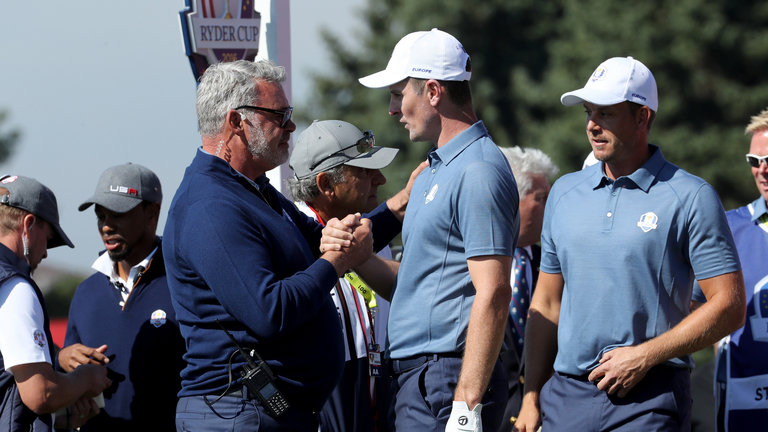 Captain Darren Clarke speaks to Justin Rose during afternoon fourball matches