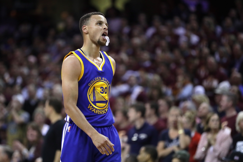 CLEVELAND OH- JUNE 08 Stephen Curry #30 of the Golden State Warriors reacts during the first half against the Cleveland Cavaliers in Game 3 of the 2016 NBA Finals at Quicken Loans Arena