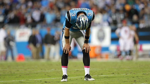 Derek Anderson #3 of the Carolina Panthers reacts after throwing an interception late in the fourth quarter against the Tampa Bay Buccaneers during their game at Bank of America Stadium