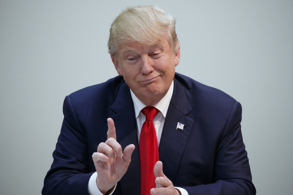 Republican presidential candidate Donald Trump gestures during a meeting with first responders at St. Johns County Sheriffs Department Monday in St. Augustine Fla