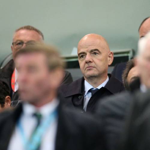 Gianni Infantino centre watches from the stands during the 2018 World Cup Qualifying soccer match Northern Ireland versus San Marino at Windsor Park Belfast Northern Ireland Saturday Oct. 8 2016