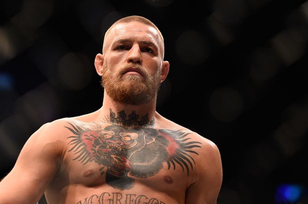 Conor Mc Gregor of Ireland prepares to fight Nate Diaz in their welterweight bout during the UFC 202 event