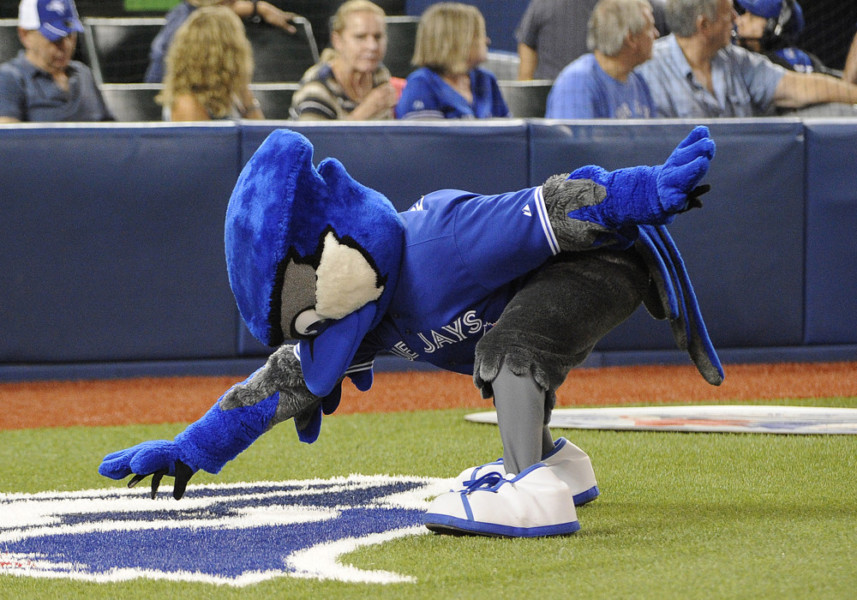 September 19 2015 Toronto Blue Jays mascot Ace picks some dirt off the Blue Jays logo before game against Boston Red Sox at Rogers Centre in Toronto ON Canada