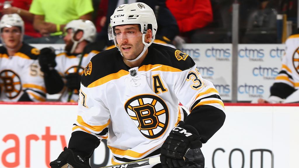 Bruins center remains day-to-day because of lower-body injury