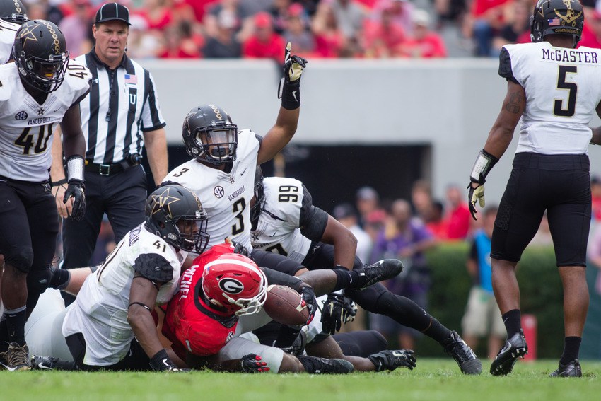 October 15th 2016 – The Commodores defense makes a stop during their 17-16 win against the University of Georgia in Sanford Stadium Saturday afternoon