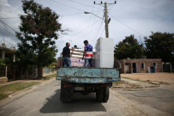 People take their belongings to shelters prior to the arrival of Hurricane Matthew in Siboney Cuba. REUTERS  Alexandre Meneghini