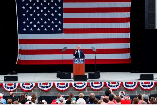 Republican presidential candidate Donald Trump meets with supporters after a rally Friday Sept. 30 2016 in Novi Mich