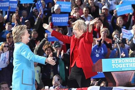 Hillary Clinton and Senator Elizabeth Warren embraced on stage during the rally