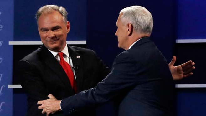 Republican vice-presidential nominee Gov. Mike Pence shakes hands with Democratic vice-presidential nominee Sen. Tim Kaine during the vice-presidential debate at Longwood University in Farmville Va. Tuesday Oct. 4 2016