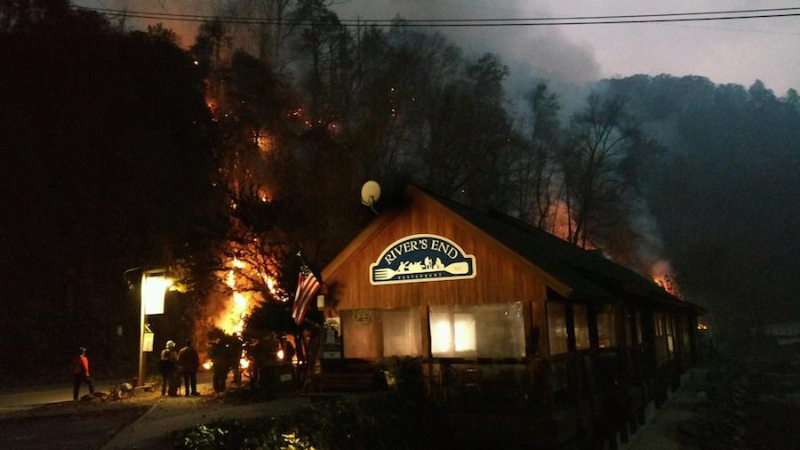 A backfire burns near a Nantahala Outdoor Center Building Nov. 12 2016