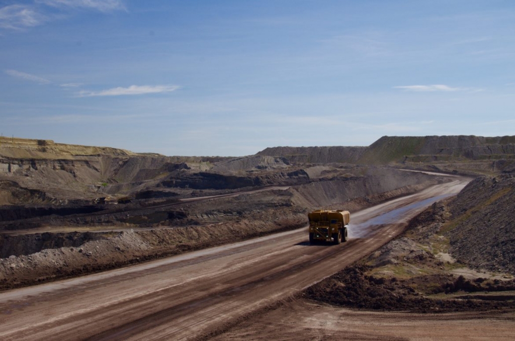 A truck sprays water to keep down the dust at Cloud Peak Energy's Antelope