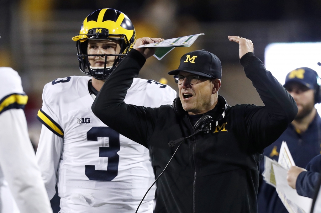 An upsetting weekend all around for college football Here Michigan coach Jim Harbaugh reacts to a call during the second half against Iowa