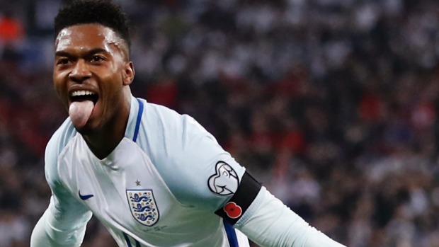 CARL RECINE  REUTERS 
 
   England's Daniel Sturridge celebrates scoring their first goal against Scotland in a World Cup qualifying match at Wembley