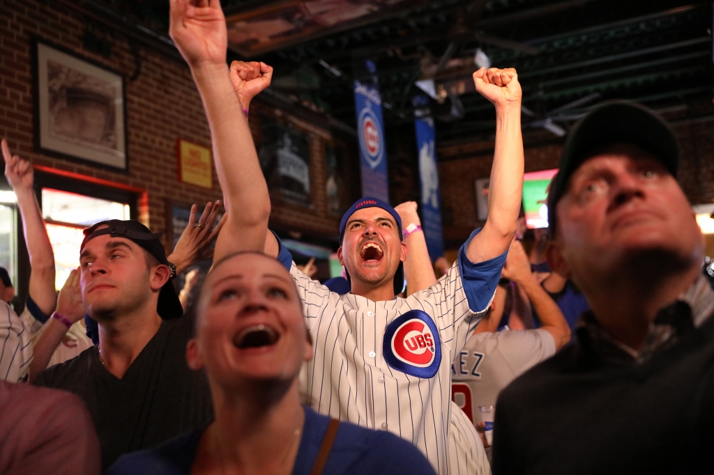 Henry Zabala from Skokie at Murphy's Bleachers celebrates a pick off while watching the Cubs win Game 7 of the World Series on Nov. 2 2016 in Chicago