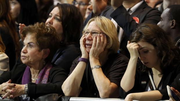 Clinton supporters look worried as results come