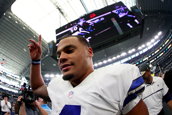 ARLINGTON TX- NOVEMBER 20 Dak Prescott #4 of the Dallas Cowboys celebrates after the Dallas Cowboys beat the Baltimore Ravens27-17 at AT&T Stadium