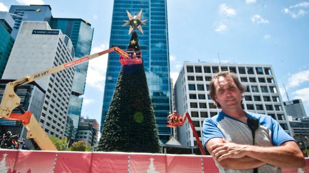 Engineer Adam Cole oversees the set up of the Lord Mayor's Christmas tree