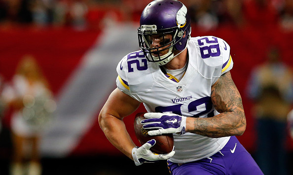 ATLANTA GA- NOVEMBER 29 Kyle Rudolph #82 of the Minnesota Vikings runs after a reception during the first half against the Atlanta Falcons at the Georgia Dome