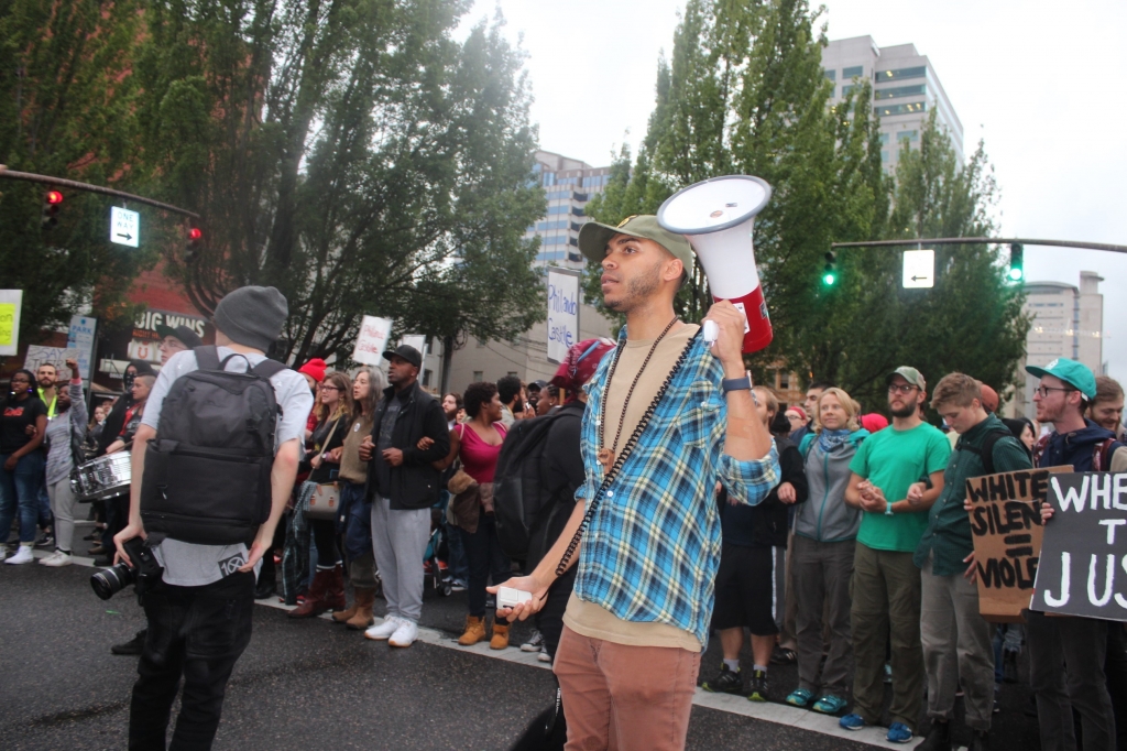 Gregory Mc Kelvey leads a protest