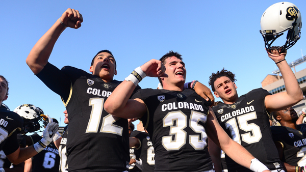 BOULDER CO- OCTOBER 1 Colorado Buffaloes players including from left quarterback Steven Montez #12 running back Beau Bisharat #35 and place kicker Chris Graham #15 sing the fight song after a 47-6 win over the Oregon State Beavers at Folsom Fiel