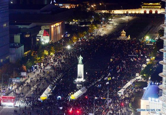 People attend a rally asking for the resignation of South Korean President Park Geun-hye in Seoul South Korea Oct. 29 2016