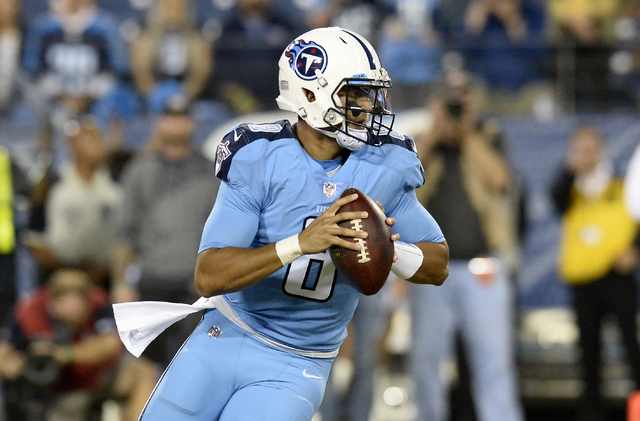 ASSOCIATED PRESS           Tennessee Titans quarterback Marcus Mariota rolls out against the Jacksonville Jaguars in the first half of an NFL football game on Oct. 27 in Nashville Tenn