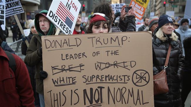 Demonstrators rally near Trump Tower after marching through Chicago Illinois protesting President Elect Donald Trump