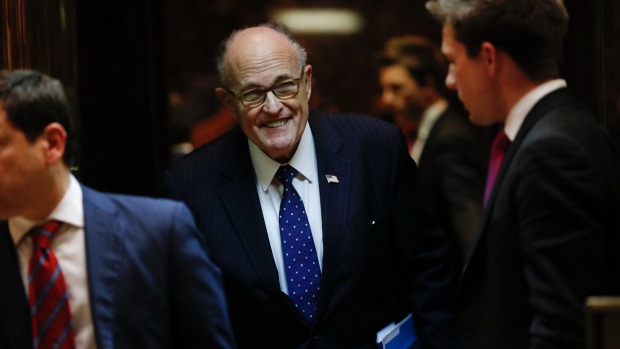 Rudy Giuliani leaves Trump Tower on Thursday. Some say the president-elect has growing reservations about naming him