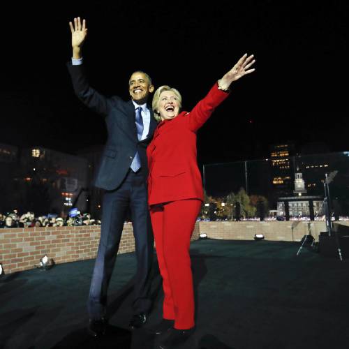 Obama waves on stage with Democratic presidential candidate Hillary Clinton during a rally at Independence Hall in Philadelphia Monday Nov. 7 2016