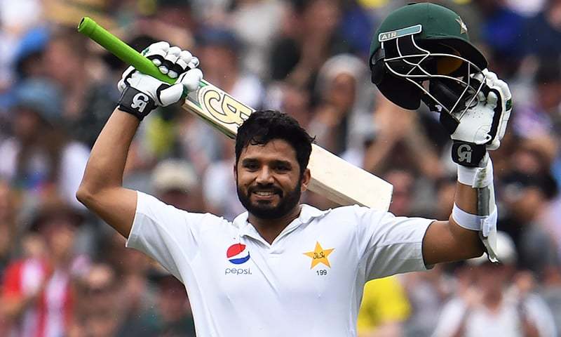 Batsman Azhar Ali celebrates after scoring his century against Australia on the second day of the second Test in Melbourne.— AFP