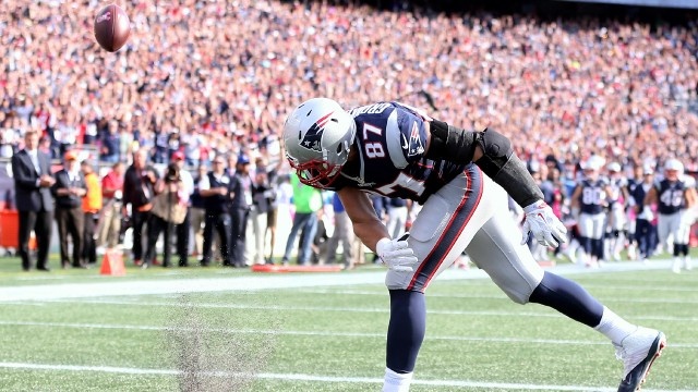 Rob Gronkowski spikes football