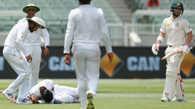 Azhar Ali was taken off after being hit in the helmet while fielding