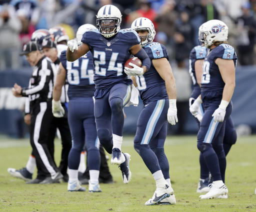 Tennessee Titans safety Daimion Stafford celebrates after recovering a fumble by Denver Broncos tight end A.J. Derby to stop the Broncos final drive in the fourth quarter of an NFL football game Sunday Dec. 11 2016