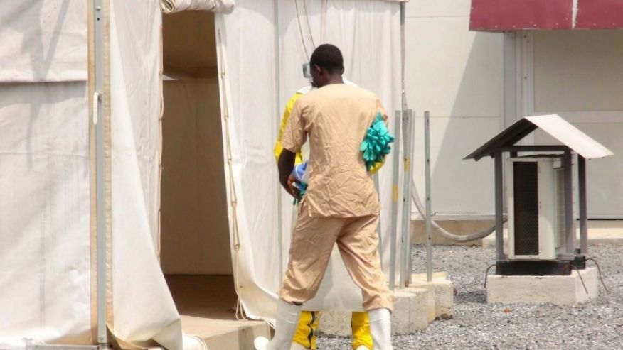 Nov. 17 2015 A health worker enters a tent in an Ebola virus treatment center in Conakry Guinea