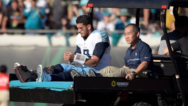 Tennessee Titans quarterback Marcus Mariota leaves the field on a cart after he was injured during the second half against the Jacksonville Jaguars on Saturday in Jacksonville Fla