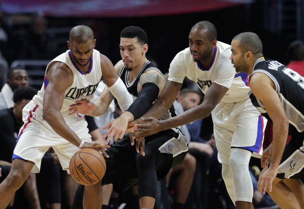 Undermanned Clippers buck late injury on Chris Paul to halt Spurs five-game win run