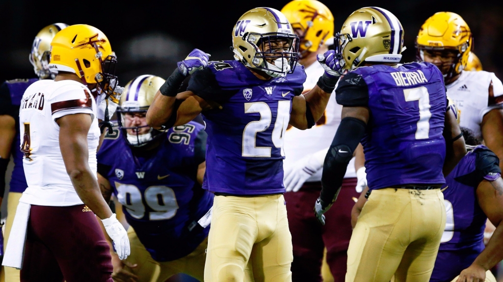 Washington Huskies defensive back Ezekiel Turner celebrates a sack against Arizona State