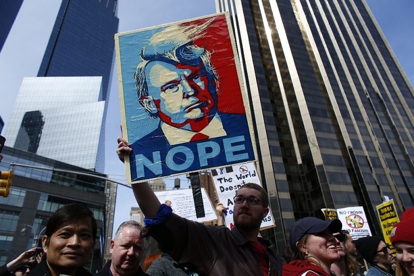 Anti-Trump protesters at a rally. AFP